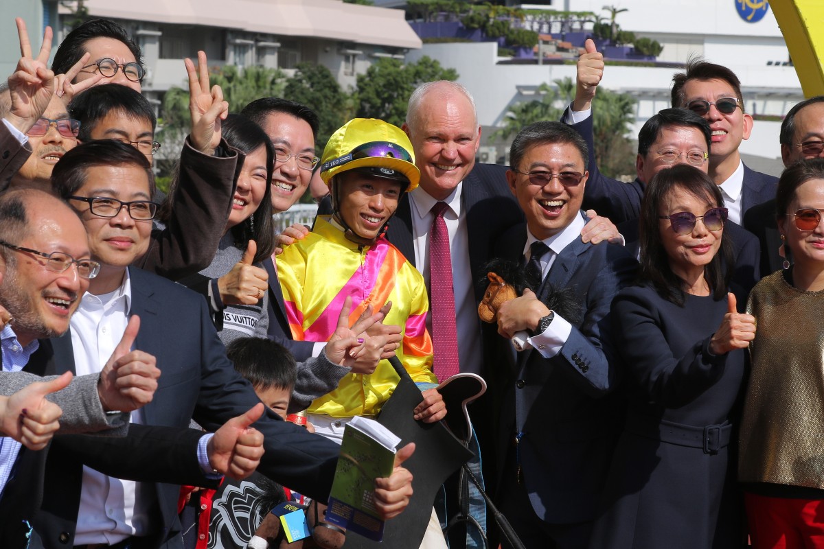 Ho Ho Khan’s connections are all smiles after his victory at Sha Tin on Sunday. Photos: Kenneth Chan