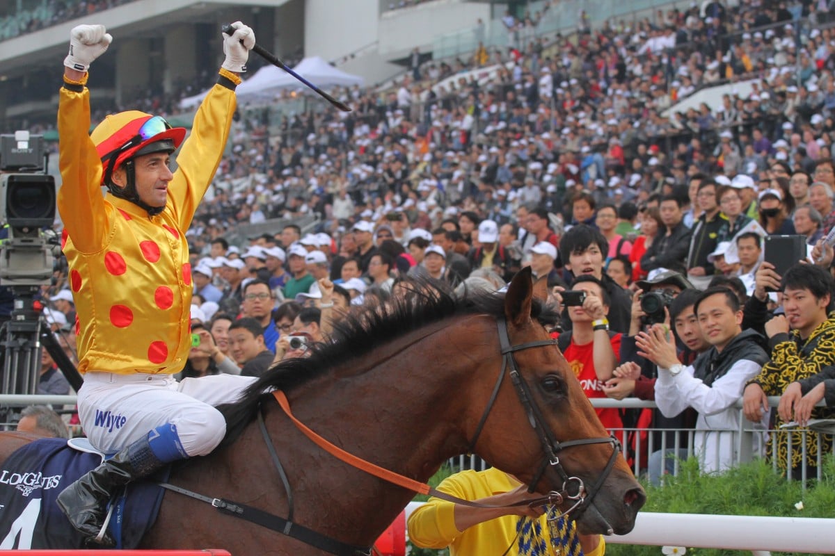 Douglas Whyte celebrates after winning the 2013 Hong Kong Cup with Akeed Mofeed. Photo: Kenneth Chan